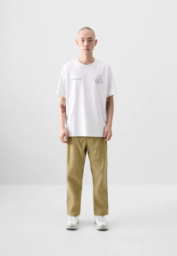 HIKE PANT - Trousers - parachute beige/college grey