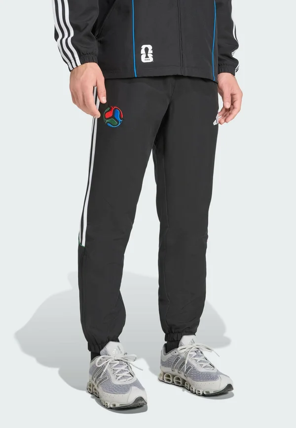 HOST TRACK  - Tracksuit bottoms - black