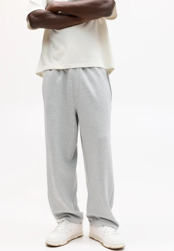 INTERLOCK - Tracksuit bottoms - light grey