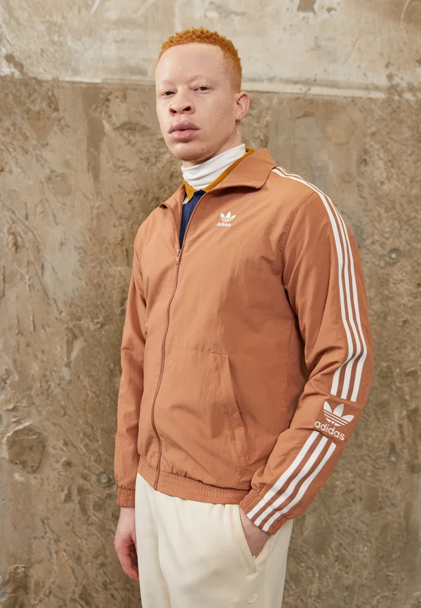 LOCK UP - Training jacket - clay strata