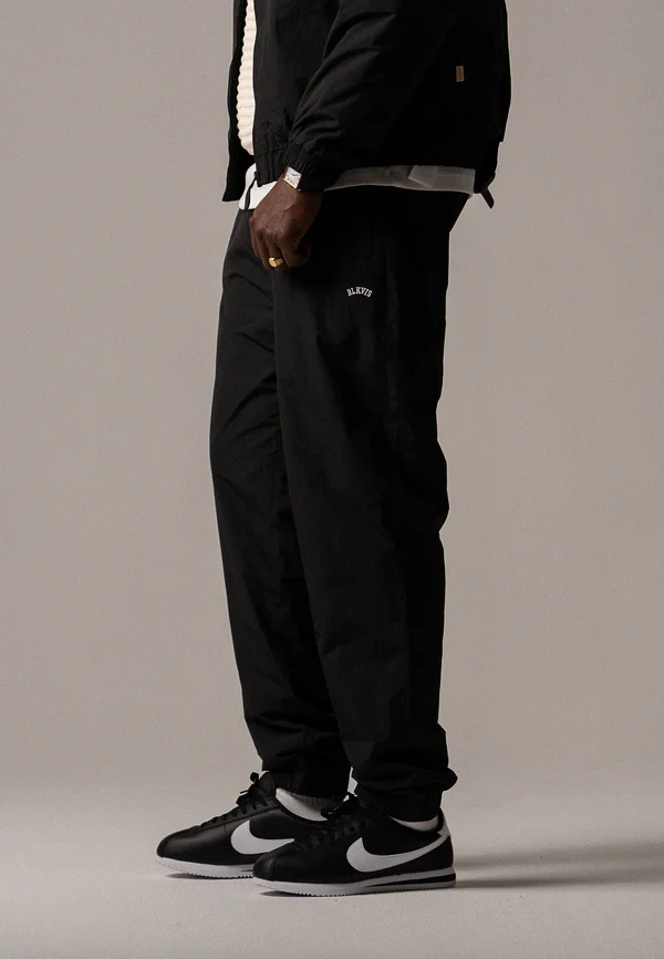 LOGO - Tracksuit bottoms - black