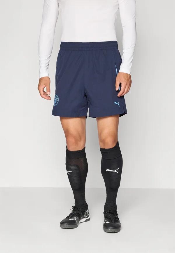 MCFC PUMATECH RELAXED SHORTS - Club wear - deep navy/team light blue