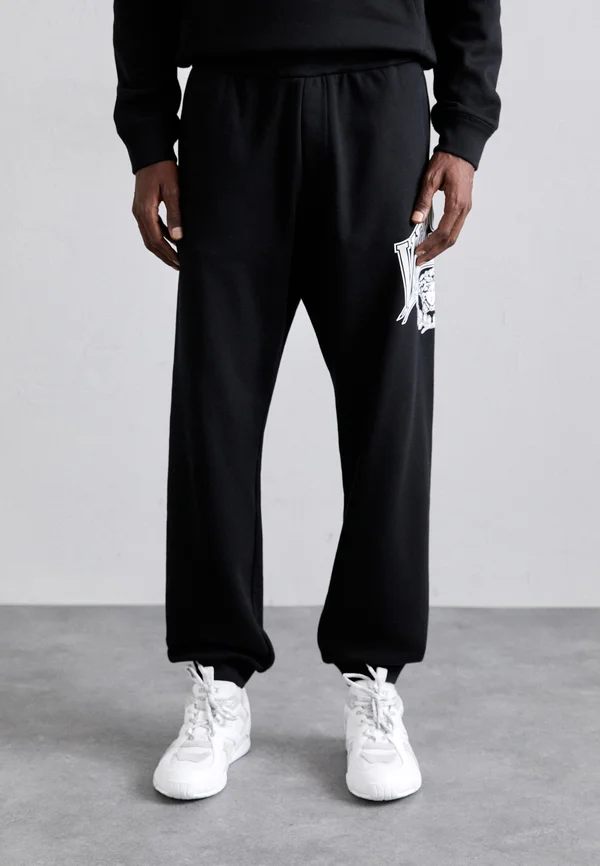 MEDUSA CREST - Tracksuit bottoms - black