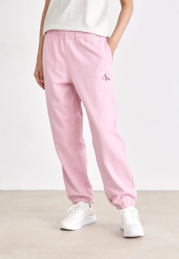 MONOLOGO - Tracksuit bottoms - pink nectar