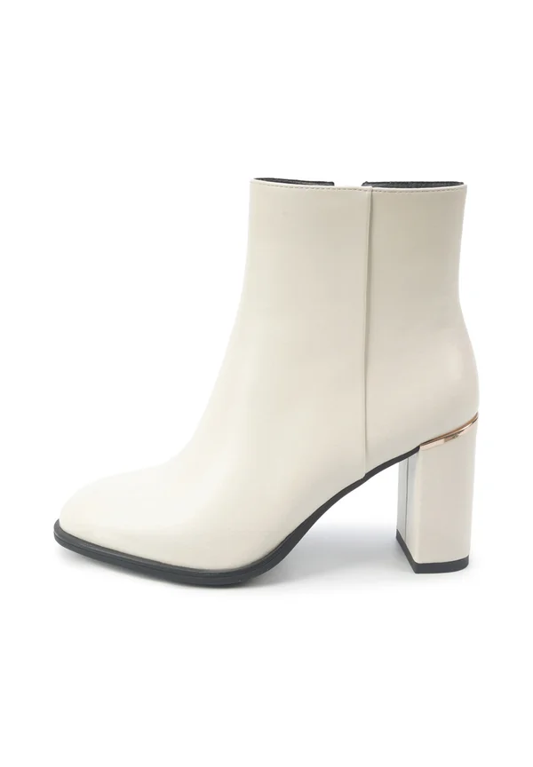 OLGA - Classic ankle boots - white