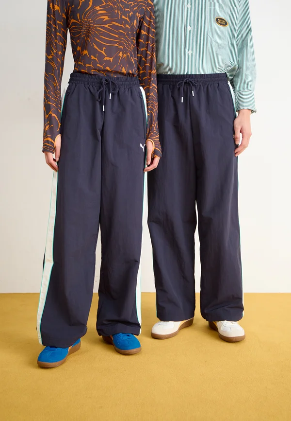 OVERSIZED TRACK PANTS UNISEX - Tracksuit bottoms - new navy