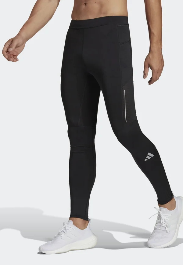 OWN THE RUN - Running tights - black