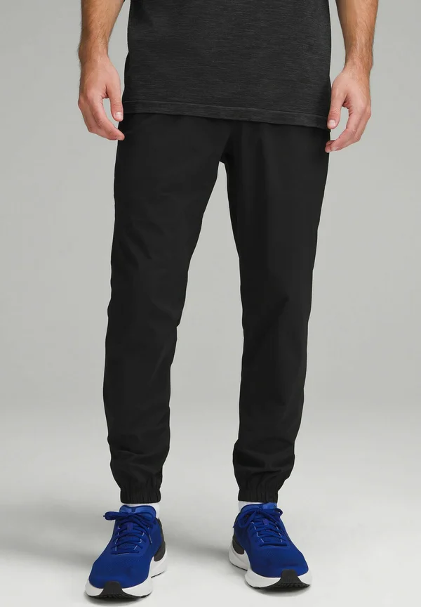 PACE BREAKER JOGGER REGULAR - Tracksuit bottoms - black
