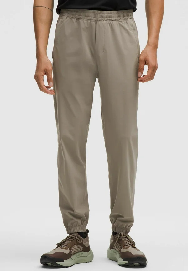 PACE BREAKER JOGGER REGULAR - Tracksuit bottoms - warm ash grey