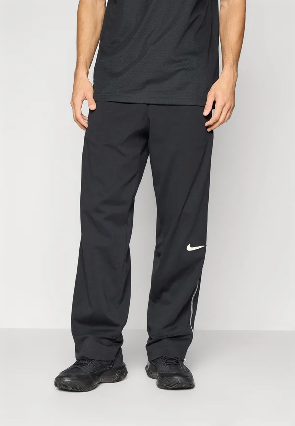 PANT NAOS - Tracksuit bottoms - black/pale ivory