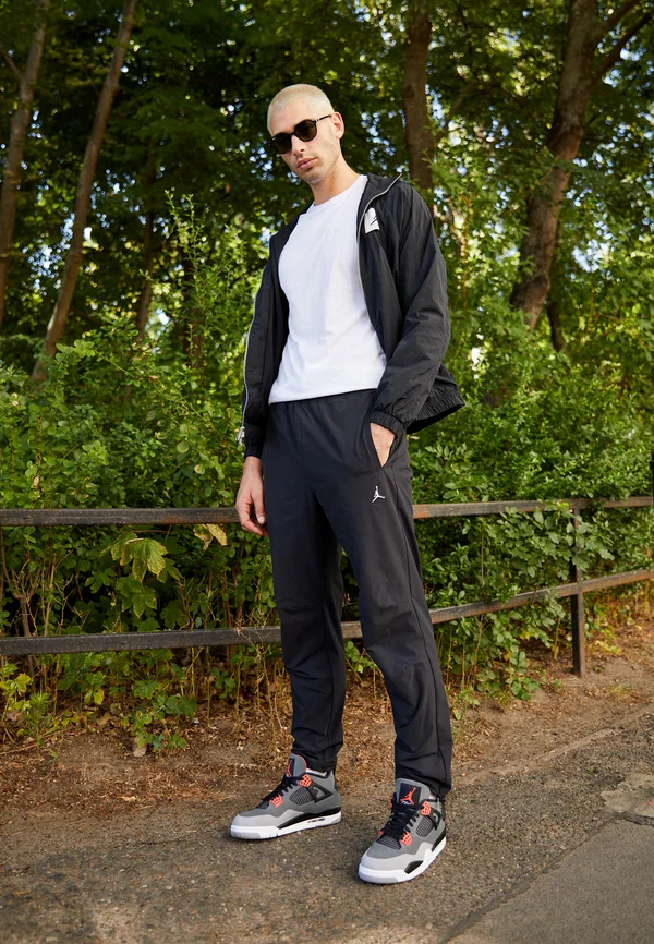 PANT - Tracksuit bottoms - black/white