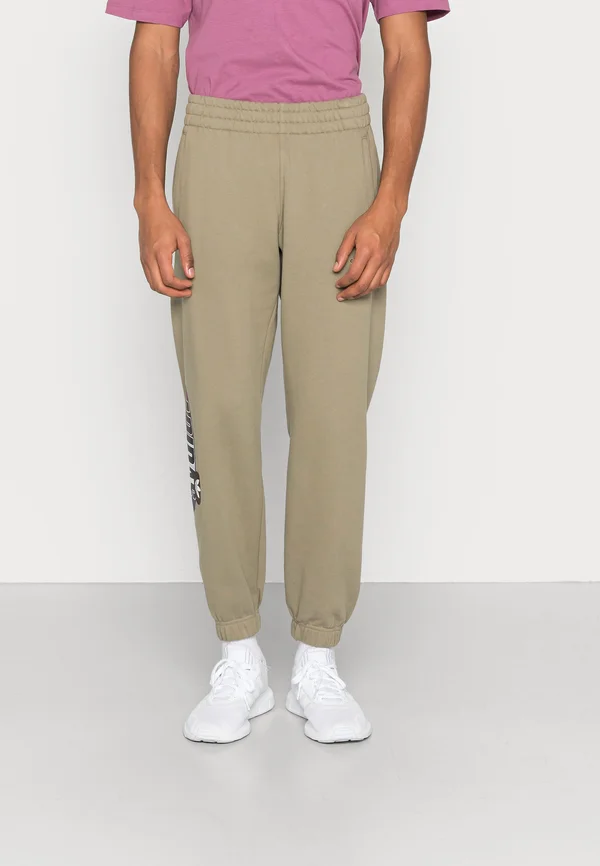 PANT - Tracksuit bottoms - orbit green