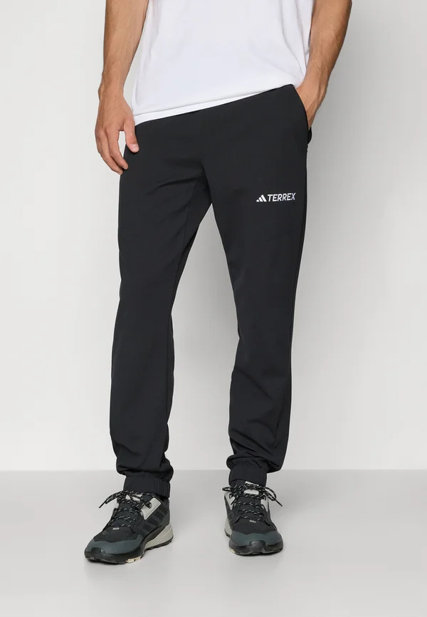 PANTS - Tracksuit bottoms - black
