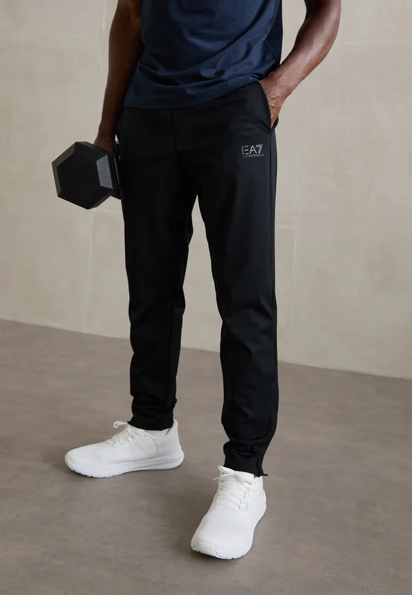 PANTS - Tracksuit bottoms - black