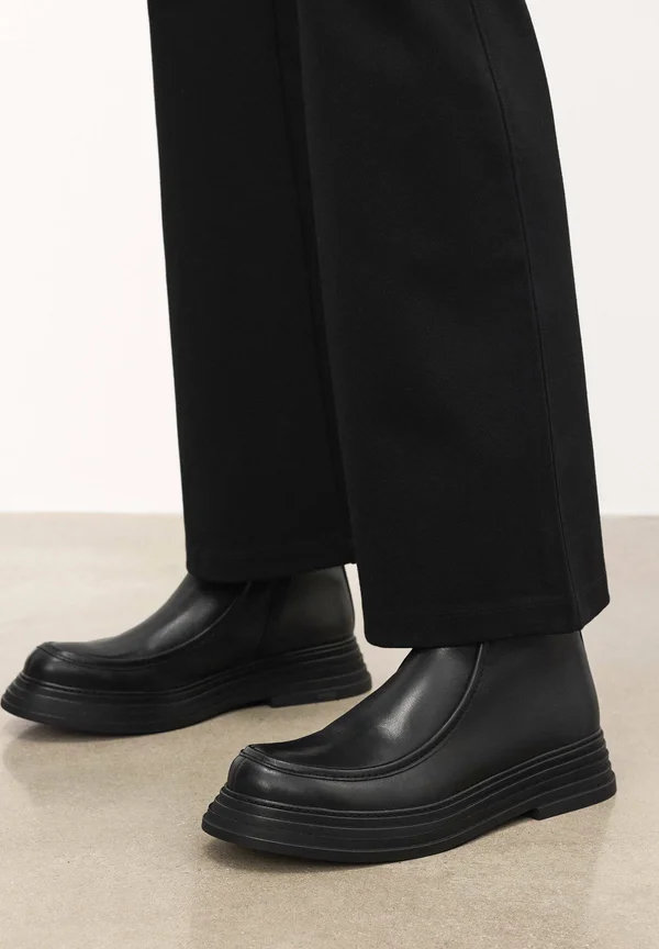 PARRAL - Platform ankle boots - black