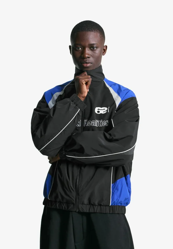 PRINTED TECHNICAL - Light jacket - black