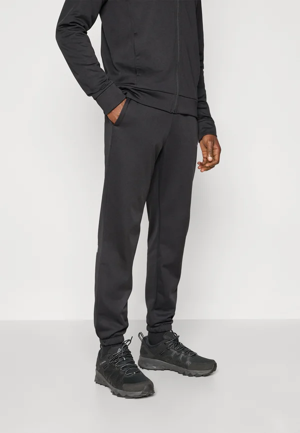 REAXION JOGGER - Tracksuit bottoms - black heather