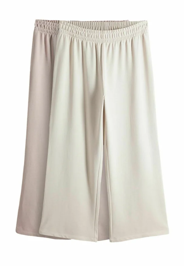 REGULAR FIT-LOOPBACK WIDE LEG JOGGERS - Tracksuit bottoms - taupe pink cream