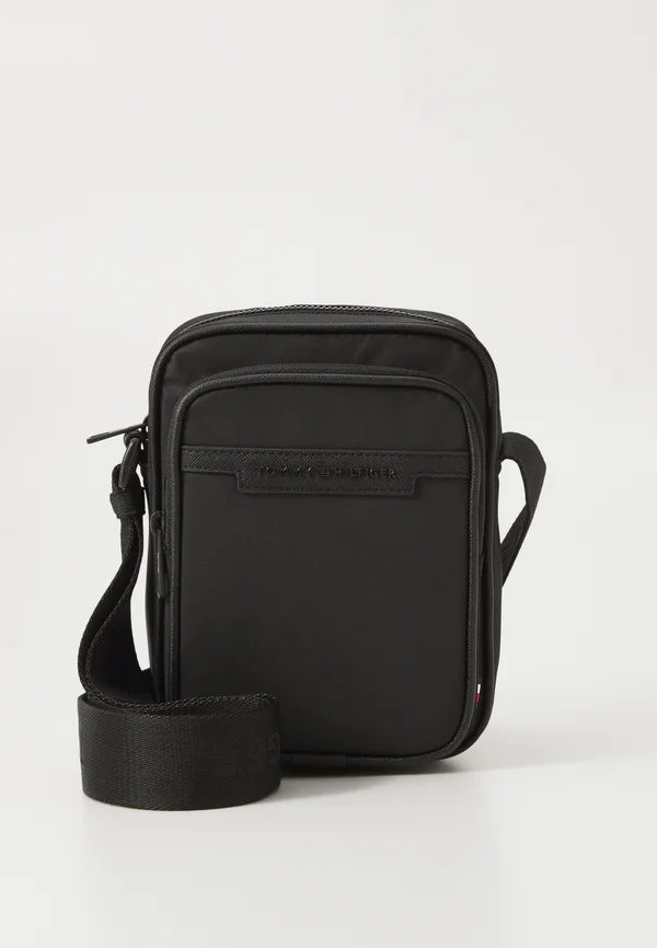REPREVE MINI REPORTER UNISEX - Cross body bag - black