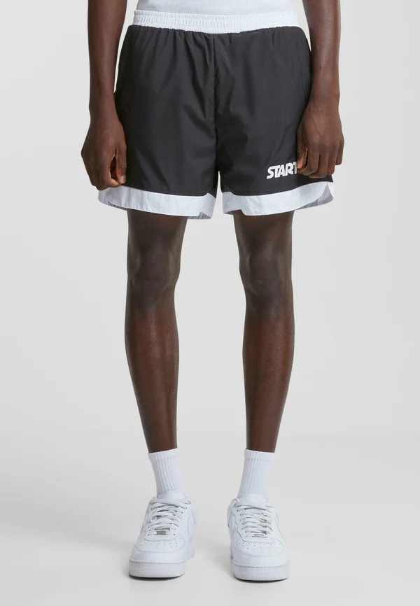 RETRO - Tracksuit bottoms - black