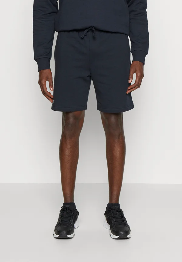 RIVAL FLEECE - Sports shorts - black/white