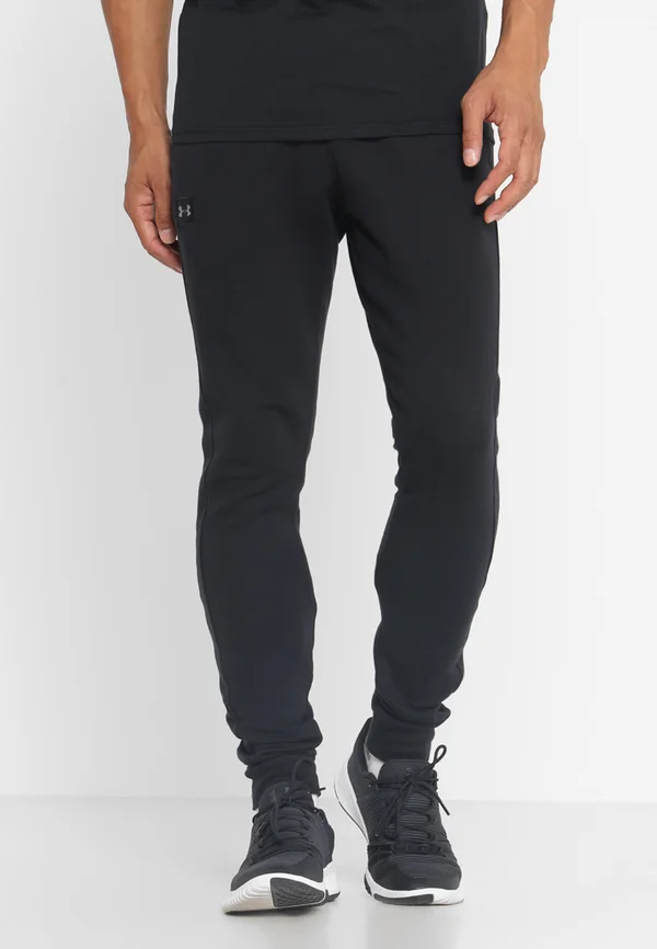 RIVAL  JOGGER - Tracksuit bottoms - black