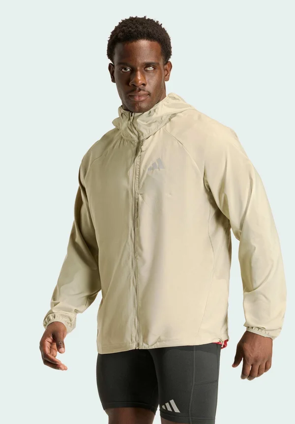 RUN ESS JKT M - Running jacket - cargo