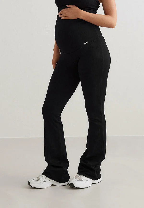 SEAMLESS FLARE MATERNITY  - Trousers - black