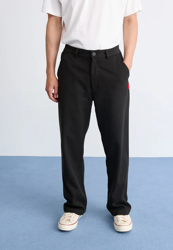 SEAMLESS TROUSERS - Trousers - black