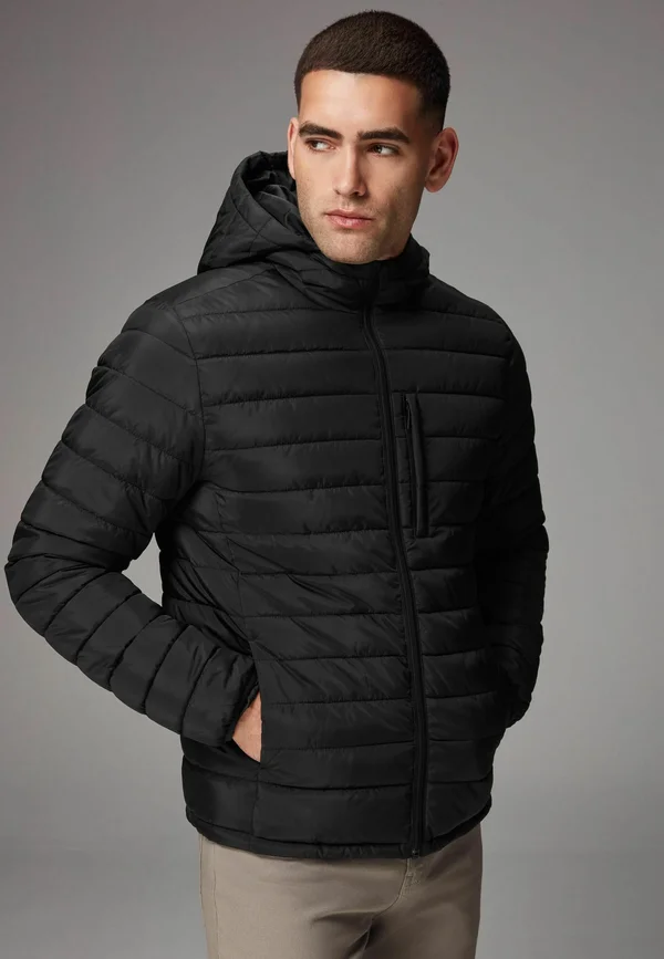 SHOWER RESISTANT WEIGHT REGULAR FIT - Winter jacket - black