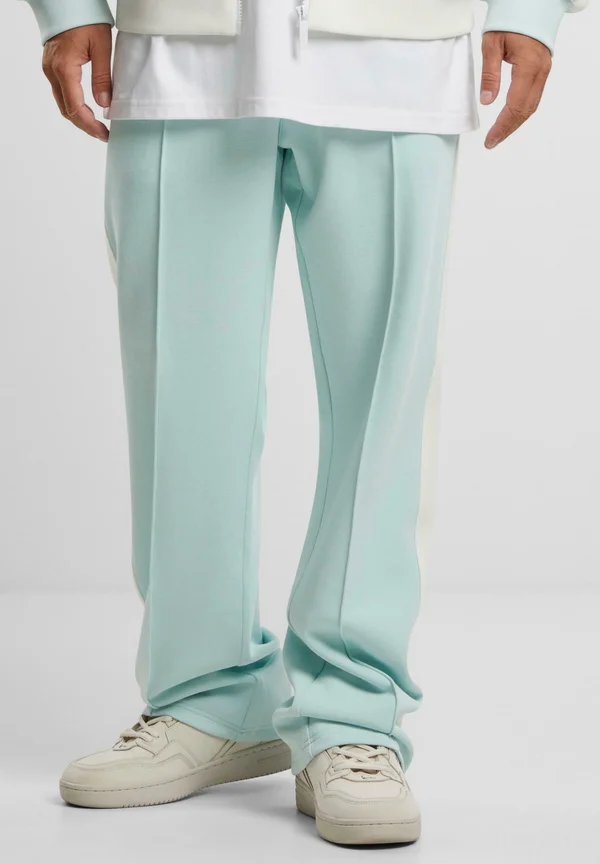 SIDESTRIPE - Tracksuit bottoms - lightaqua offwhite