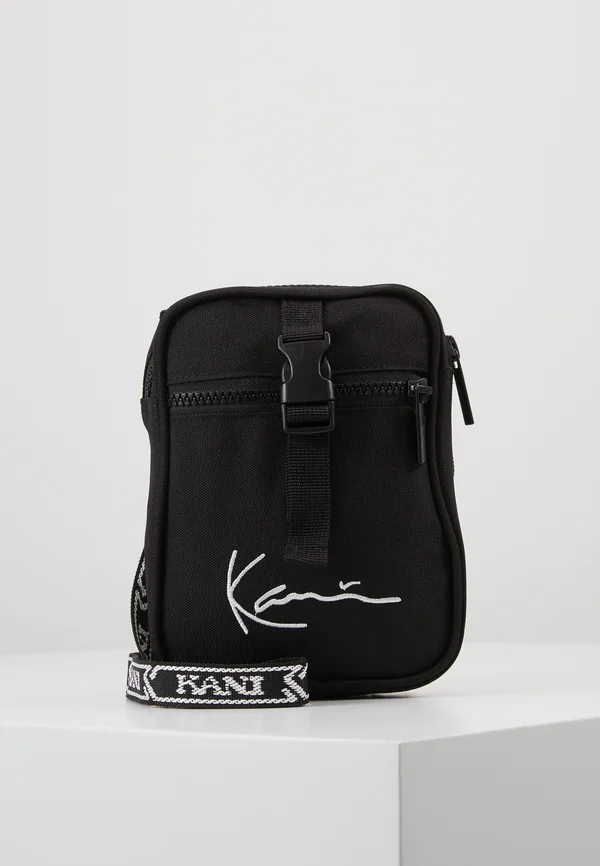 SIGNATURE TAPE MESSENGER BAG - Cross body bag - black/white