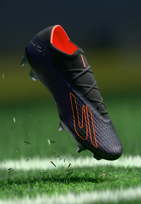 SKX 2 ELITE SG - Soft-ground football boots - black/orange