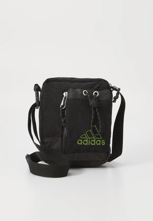 SMALL ITEM BAG UNISEX - Cross body bag - black