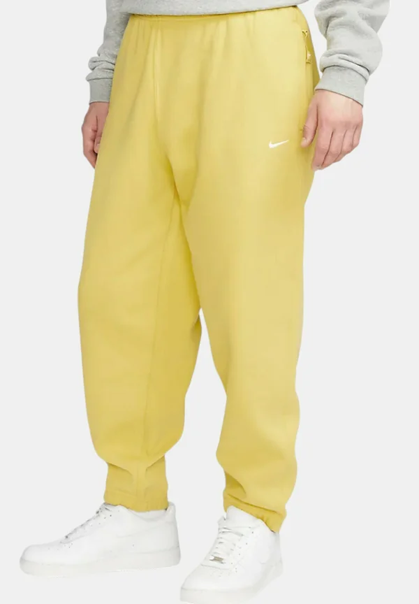SOLO - Tracksuit bottoms - gold white