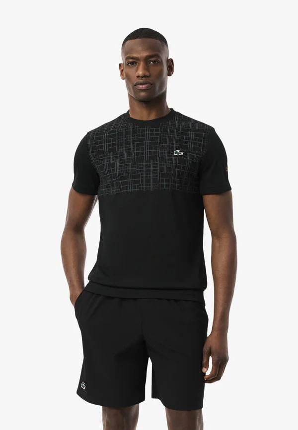 Sports shorts - noir jaune fi