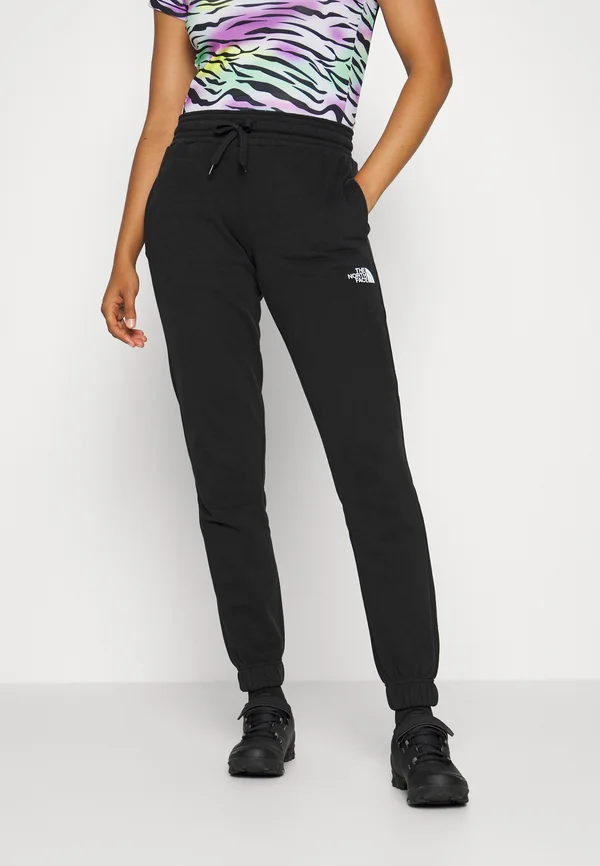 STANDARD - Tracksuit bottoms - black