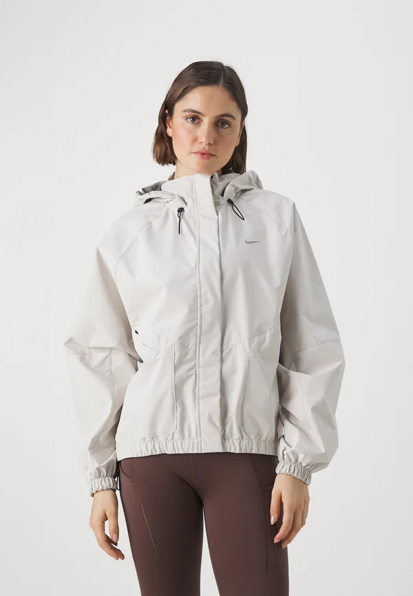 STORM-FIT SWIFT - Running jacket - light orewood brown black