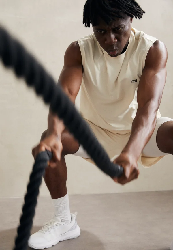 STRIDE SLEEVELESS MEN - Top - cream