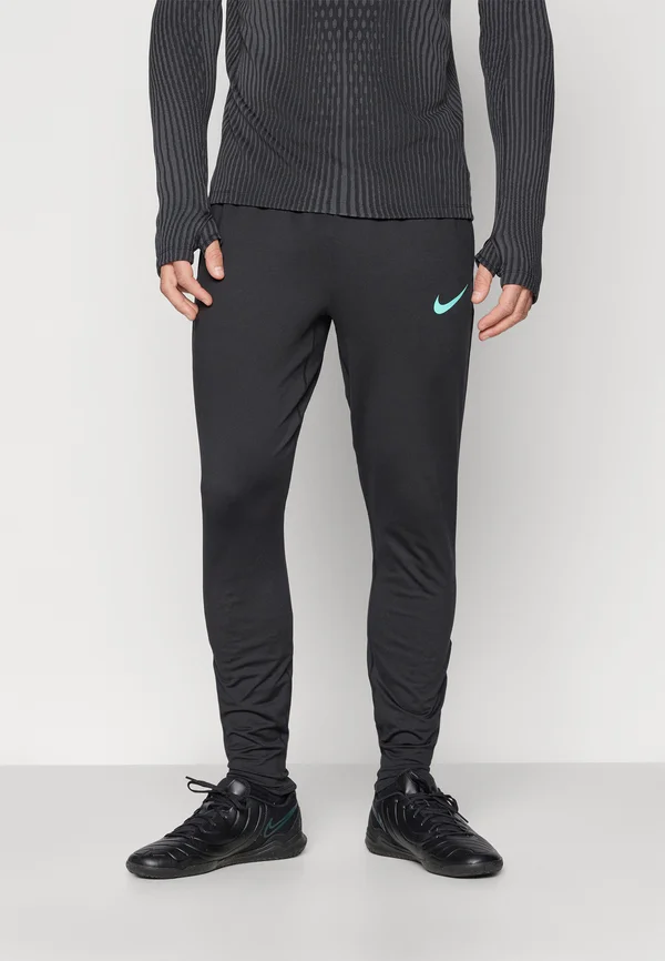 STRIKE PANT - Tracksuit bottoms - black/dynamic turquoise