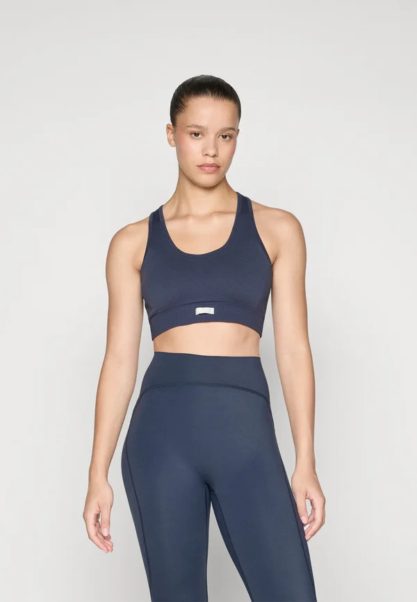 STUDIO SEAMLESS LOW BRA - Light support sports bra - outerspace