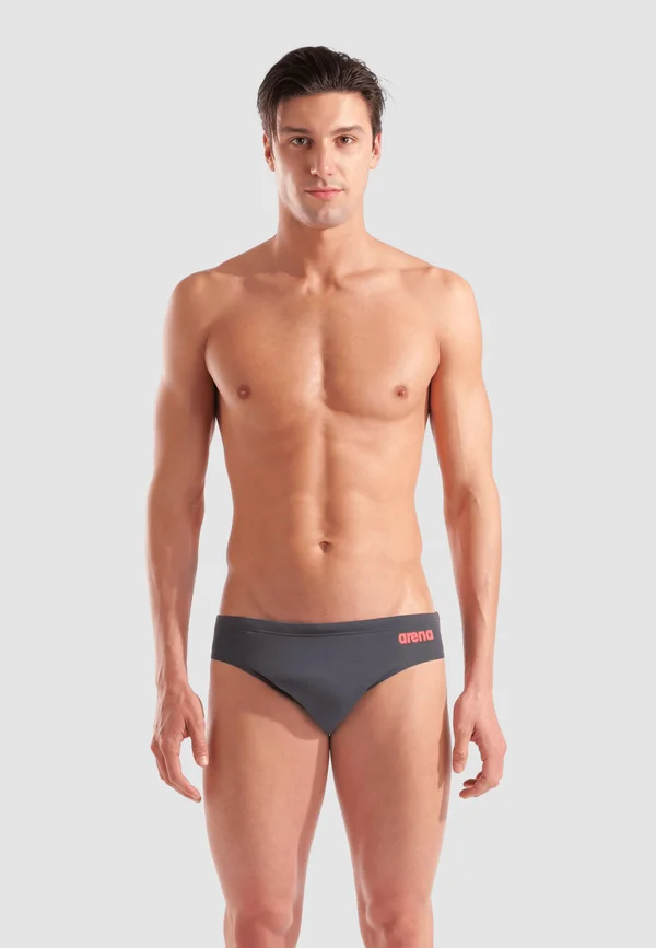 TEAM SOLID - Swimming briefs - asphalt-bright coral