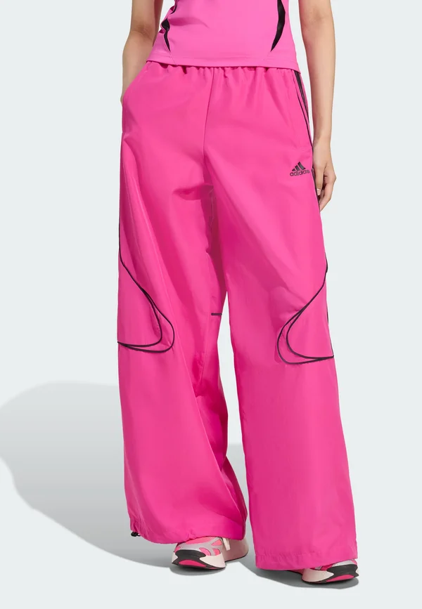 TEAMGEIST - Tracksuit bottoms - semi lucid fuchsia black
