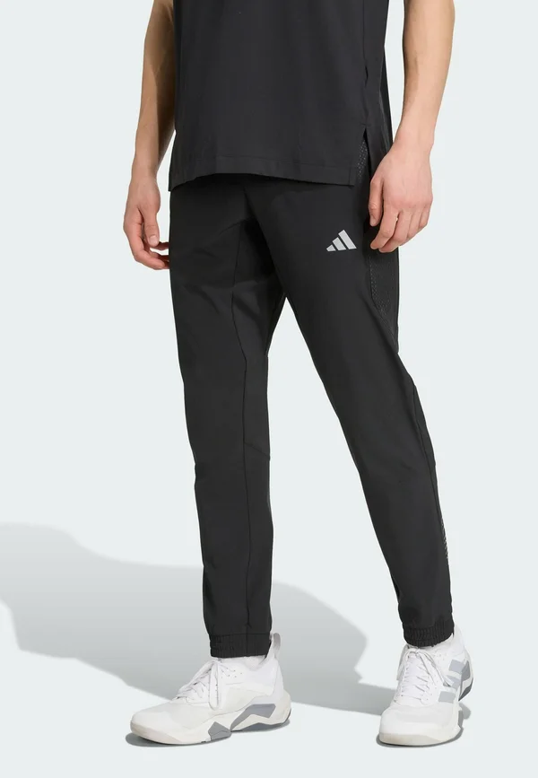 TECH APP - Tracksuit bottoms - black   carbon