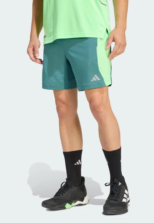 TECH - Sports shorts - preloved teal/lime burst