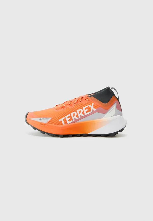 TERREX AGRAVIC TRAIL - Trail running shoes - semi impact orange/ftwr white/carbon
