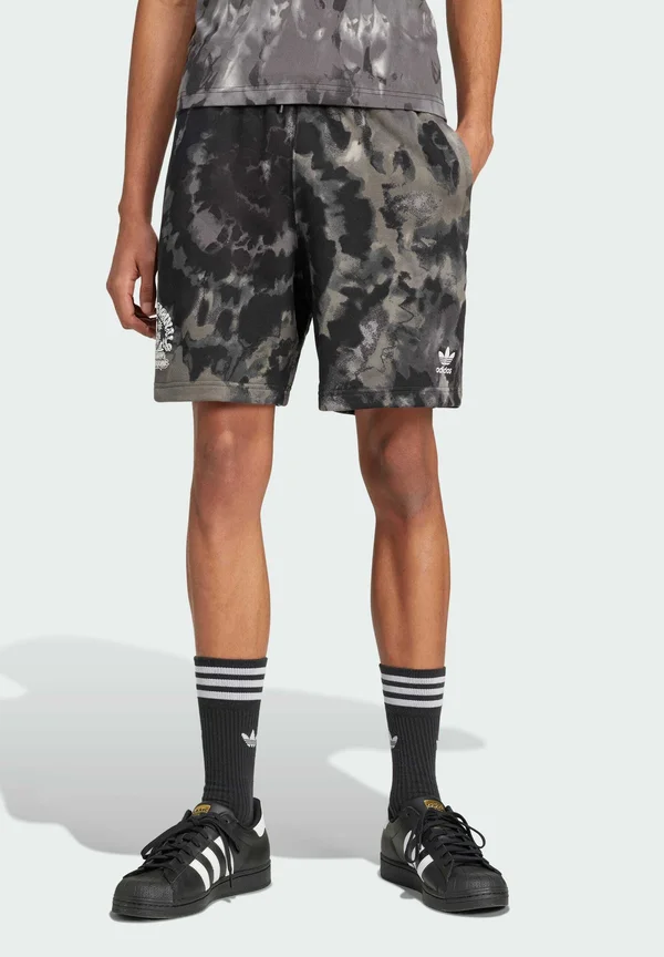 TIE-DYED - Tracksuit bottoms - black