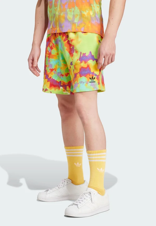 TIE-DYED - Tracksuit bottoms - impact yellow