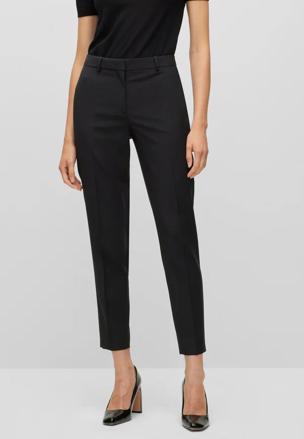 TILUNAH - Trousers - black