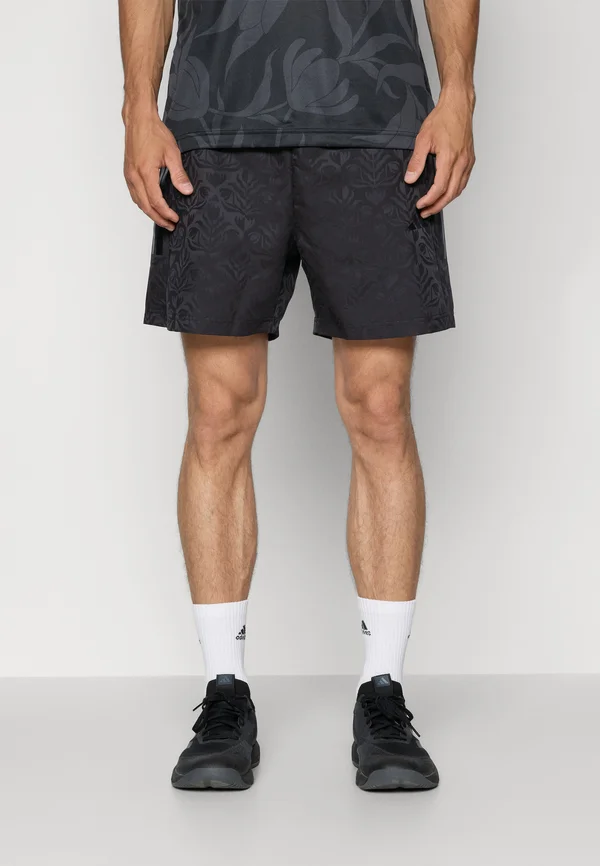 TIRO  - Sports shorts - black